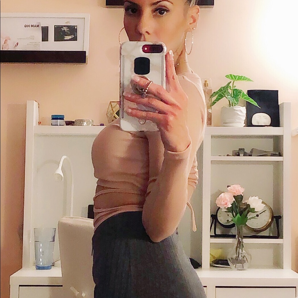 Super cute light pink top.